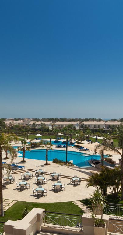 Jaz Little Venice Golf Resort Ain Sukhna Dış mekan fotoğraf View of the pool at the Al Hamra Golf Club